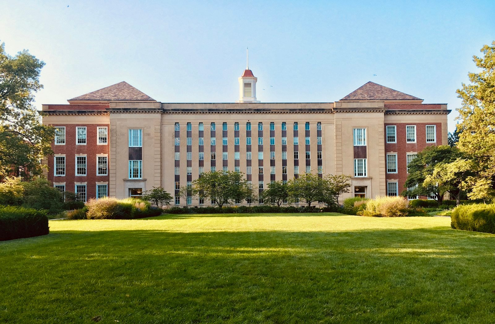 A university faculty building on a landscaped campus